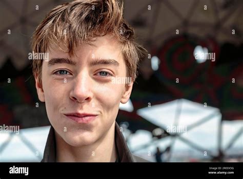 Close Up Portrait Of A Smiling Teenage Boy Stock Photo Alamy