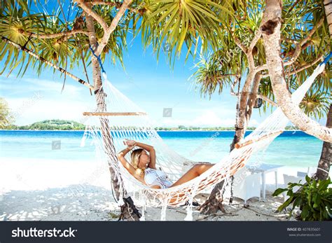 Woman Relaxing Hammock On Tropical Beach Stock Photo