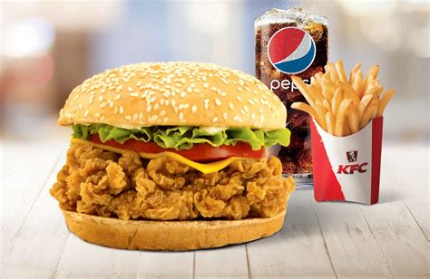 Chicken fillet is marinated with salt, mustard paste, black pepper and then coated in. Zingers | KFC Jamaica