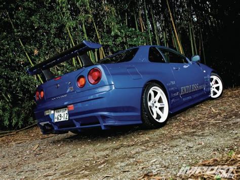 Beefed up aesthetics, upgraded performance, and an unmistakable bayside blue paint job. nissan, R34, Skyline, Gtr, Supercars, Cars, Coupe, Tuning ...
