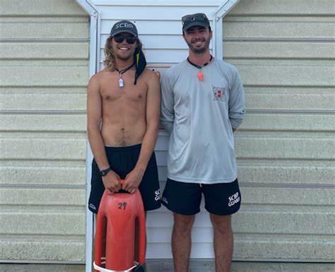 Hero Lifeguards Raced Through Waves To Rescue Pilot After Banner Plane