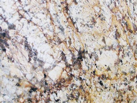 Sweeping Gold Veins Characterize This Gorgeous Rare Solarious Granite