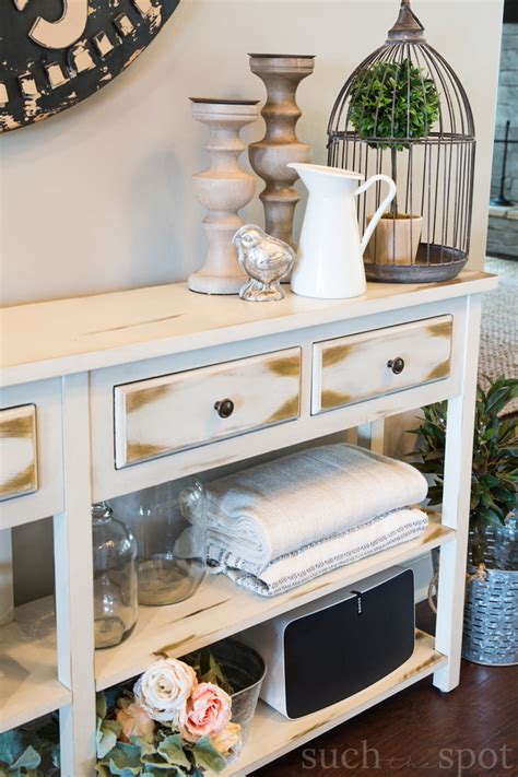 While decorating your console table, work in the principles of contrast, balance and symmetry to style your vignettes. Console-Table-For-Spring-5237 - Such the Spot