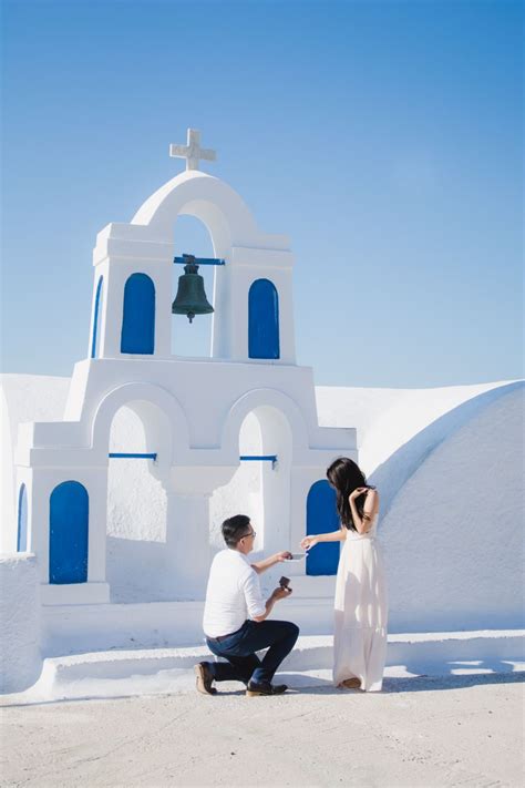 surprise proposal in santorini oia photo shoot in thira santorini greece oia proposal