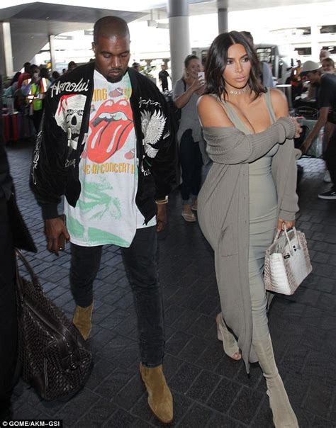 Kim Kardashian In Eye Popping Dress As She Departs For Paris With Kanye West Daily Mail Online