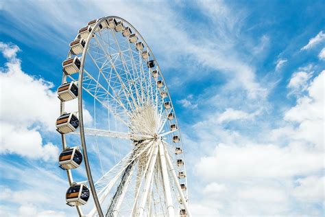 Ferris Wheel With The Sky Background Free Image By Clouds Amusement Park Sky
