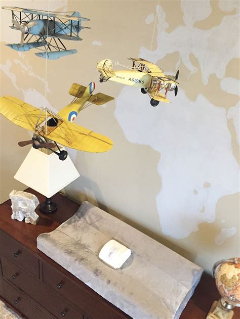 Check Out This Adorable Airplane Themed Nursery With A World Map