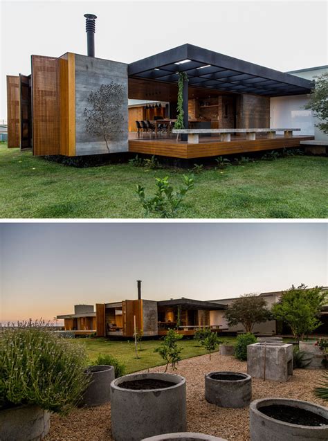 This House Is A Warm Display Of Wood Concrete Stone And Steel