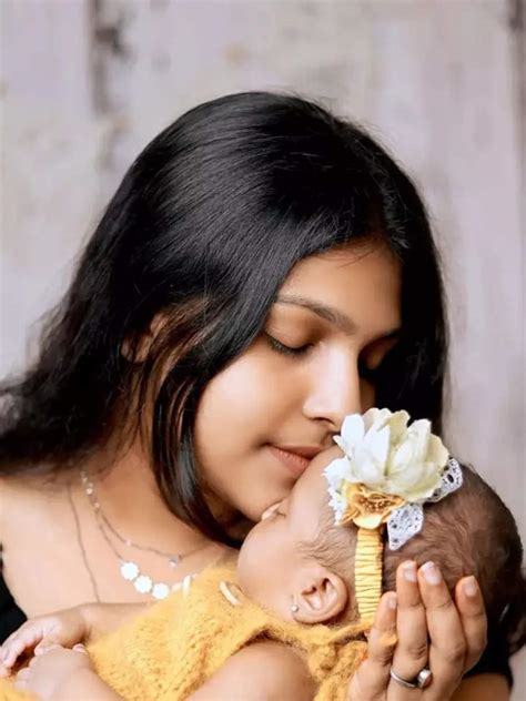 Adorable Clicks Of Arya Parvathi With Her Baby Sister Times Of India