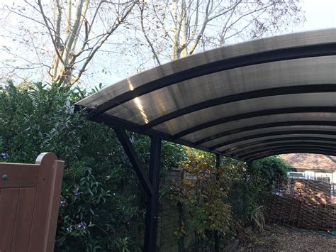 We bring you the best metal carports and triple wide steel carports across the usa. A Long Double Carport Installed in Bognor Regis | Kappion ...