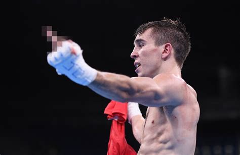 michael conlan of ireland reacts after losing on points during his bantamweight quarter final