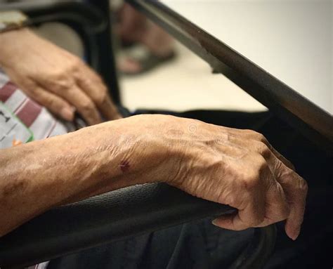 Old Man Hands Resting On Chair Handle Stock Photo Image Of Fingers