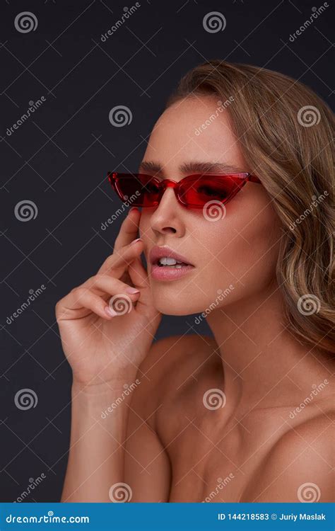 Portrait Of Beautiful Young Woman With Perfect Makeup Wearing Pink Sunglasses Stock Image