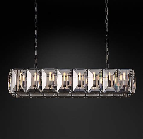 Inspired by a german chandelier from the 1970s, our fixture evokes the boldness and glamour of the era. Harlow Crystal Rectangular Chandelier 55"