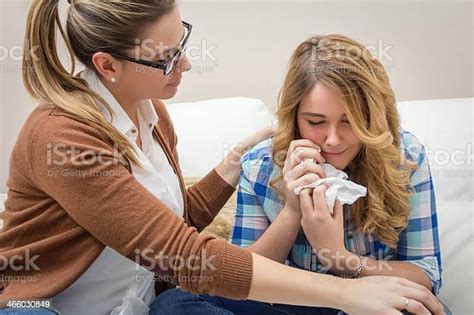 Mother Soothes Sad Teen Daughter Crying Stock Photo Download Image