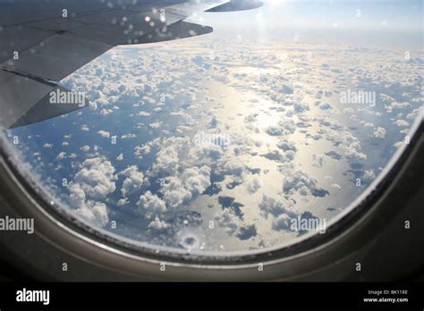 Airplane Window View At High Altitude Crossing Ocean Boeing 777 400