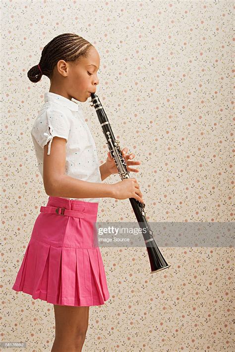 Girl Playing Clarinet High Res Stock Photo Getty Images