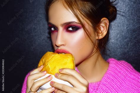 Woman Eats A Burger Food Food Porn Teen Girls Enjoying Delicious Burgers In Cafe Beautiful