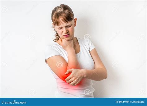 Woman With Elbow Pain Is Holding Her Aching Arm Stock Photo Image Of