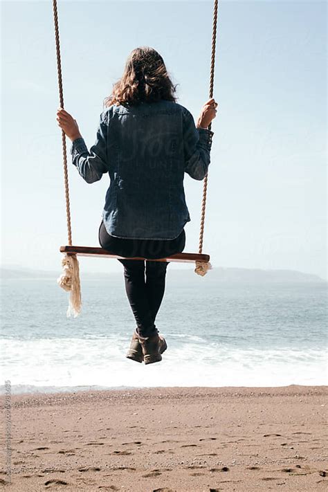 Woman On A High Swing On The Beach By Lucas Saugen Swinging Beach