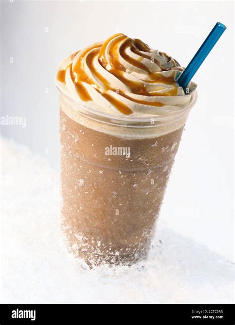 Iced Caramel Coffee Covered With Whipped Cream Stock Photo Alamy
