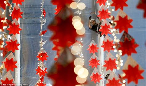 John Lewis Christmas decorations are put up at London store 79 DAYS