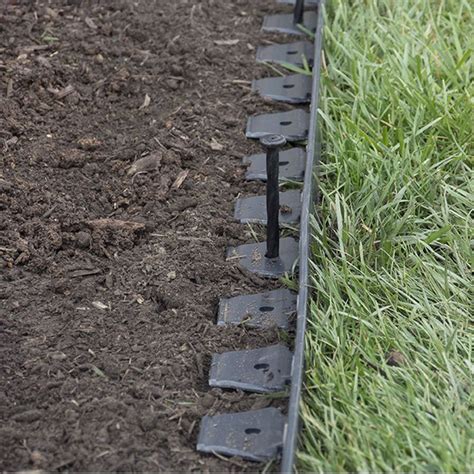 Landscape edging gives your lawn a finished and tidy look. EasyFlex 2-inch Tall Wall Plastic No-Dig Landscape Edging ...