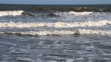 Large Waves And Surf Coming In From The Ocean Image Free Stock Photo