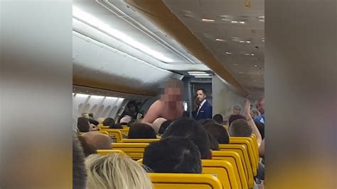Topless Ryanair Passenger Screams And Throws Punch As Cabin Crew Step In Mirror Online