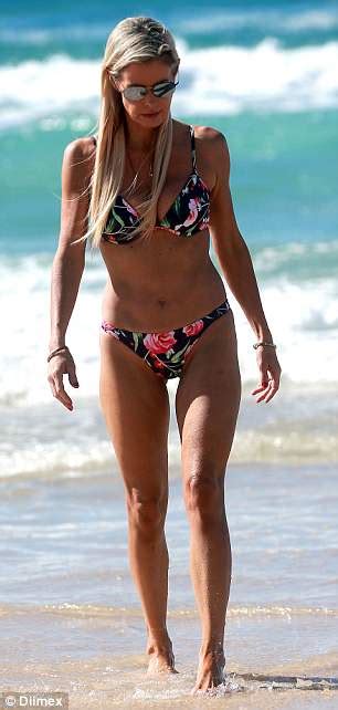 Former Neighbours Star Emma Harrison Strips Down To A Skimpy Bikini Daily Mail Online