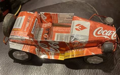 Handmade Car Made From Recycled Coca Cola Soda Cans Folk Art Toy 1500