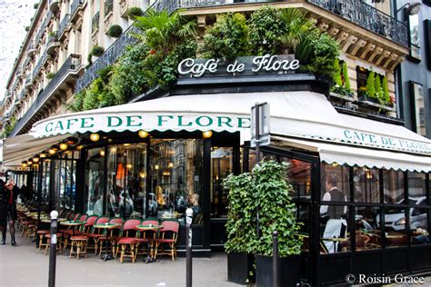 It owes its name to a small sculpture of deity that stood on the other side of the boulevard. Cafe de Flore Paris Photo Print Paris cafe Paris