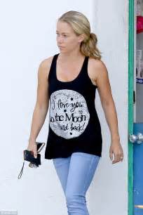 Kendra Wilkinson Wears Statement Tank Top After She Dukes It Out With