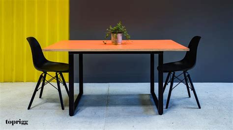 The tile will take whatever the elements (or a drinking glass) can dish out. Plywood Dining Table - LOOP