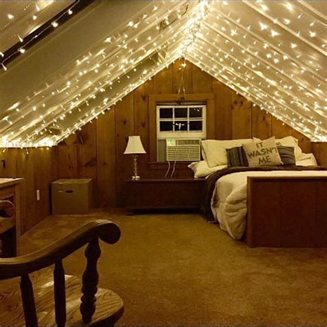 If the room is large enough, some designers place the bed at an angle to visually break up the long rectangle. Attic bedroom ideas fairy lights in 2020 | Angled bedroom ...