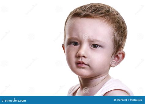 Studio Closeup Portrait Of Little Baby Boy With Serious Face Loo Stock