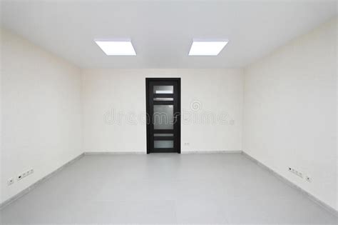 Interior Empty Office Light Room With White Wallpaper Unfurnished In A
