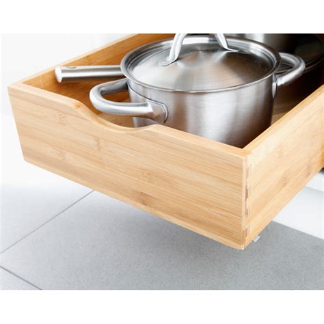 My favorite kitchen drawer organizers for my flatware and cutlery are the wooden or bamboo ones that match my wood cabinets. Bamboo Roll-Out Cabinet Drawers | The Container Store