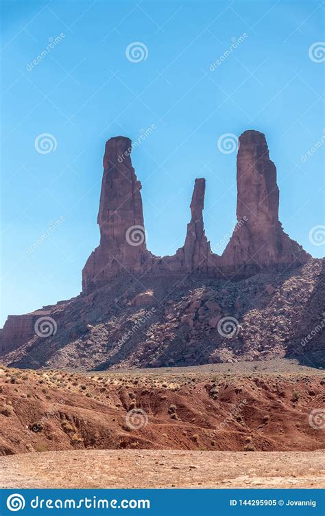 Red Rocks Of Monument Valley On A Clear Summer Day The Three Sisters