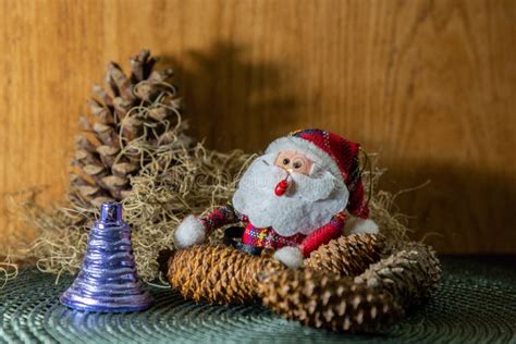 Santa Claus Amid Pine Cones And Christmas Motifs Stock Photo Image Of