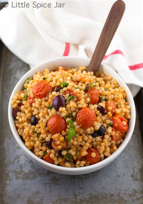 When hot, add the oil, then the shrimp, and cook until opaque, 2 ½ minutes per side, stirring in the garlic for the last minute. Mediterranean Pearl Couscous Salad - Little Spice Jar