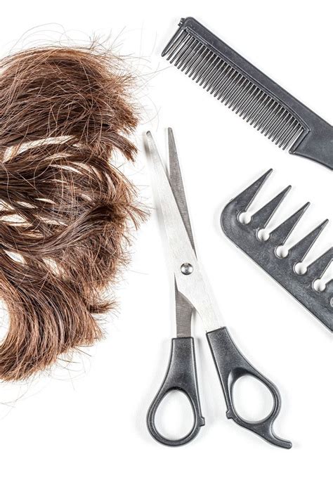 A Bundle Of Cut Hair With Scissors On A White Background Haircut Change