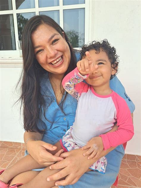 latina mom and daughter show their love by living with autism spectrum disorder a developmental