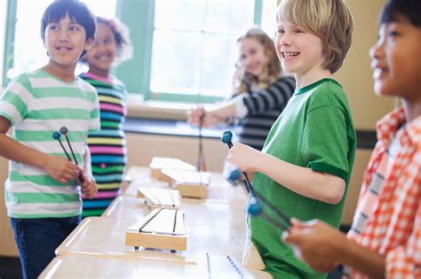 Group Of Elementary Students With Xylophones Stock Photo Download