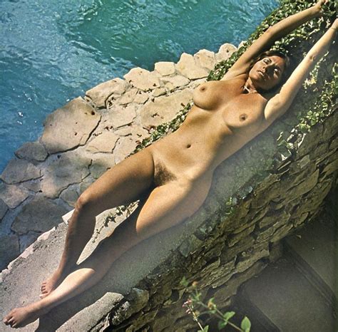 Uschi Digard Lying Down Nude And Showing Her Big Boobs And Hairy Pussy