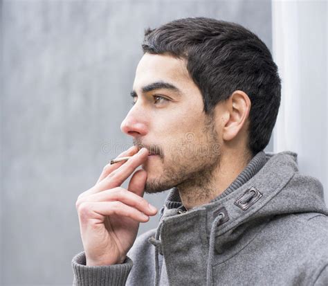 Portrait Of Man Smoking A Cigarette Outdoor Stock Image Image Of