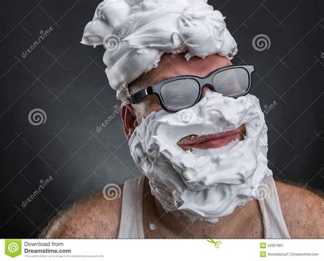 Funny Man With Shaving Foam Covered Face Stock Image
