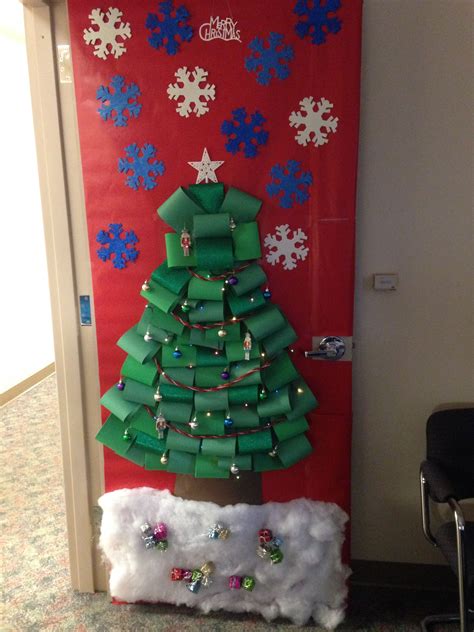 Diy your own holiday decorations to make every inch of your home as festive as possible. Office Christmas door decoration contest. Christmas tree ...