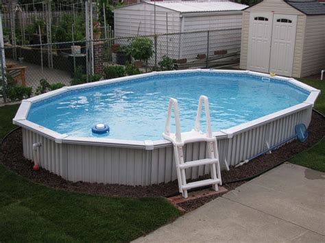 The best if we want our swimming pool to be operational at the end of the summer? Semi-Inground Pool | Semi inground pools, Above ground ...