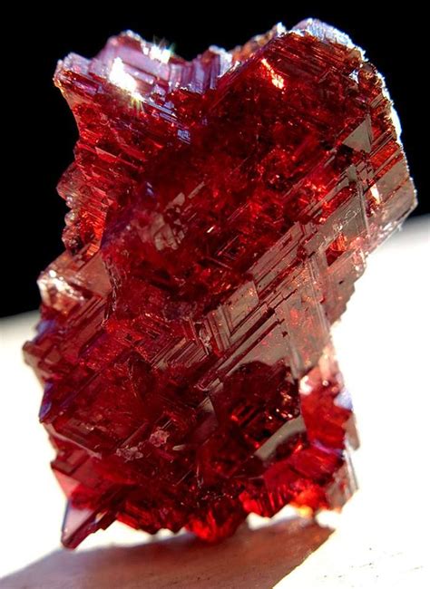 Deep Red Spessartite Garnet Crystal From Navegador Mine Brazil Photo